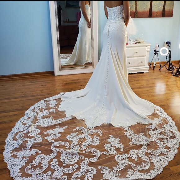 Strapless summer wedding dress with long lace train